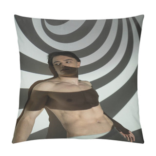 Personality  Sexy, Young And Good Looking Man With Muscular Torso And Shirtless Body Looking Away While Standing And Posing In Underpants On Abstract Black And White Background With Spiral Projection Pillow Covers