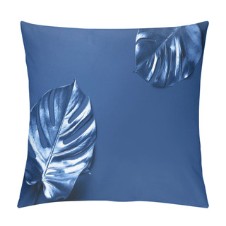 Personality  Exotic Summer Trend In Minimal Style. Tropical Palm Monstera Leaf On Classic Blue Color Background. Shiny And Sparkle Design, Fashion Concept. Pillow Covers