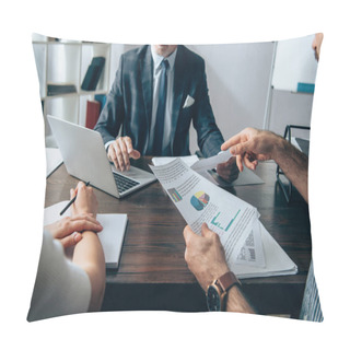 Personality  Cropped View Of Businessman Pointing At Papers With Charts Near Colleague With Notebook And Investor Using Laptop On Blurred Background  Pillow Covers