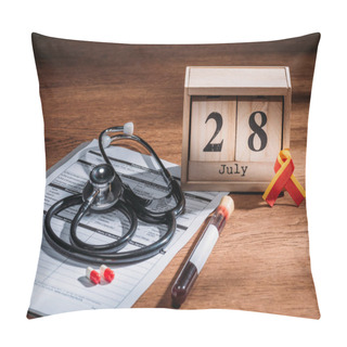Personality  Selective Focus Of Wooden Calendar With 28th Jule Date, Medical Questionnaire, Pills, Stethoscope, Test Flask With Blood Sample, World Hepatitis Day Concept Pillow Covers