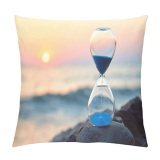 Personality  Hourglass With Sand Standing On Rock. Sunset Over Sea And Nature Landscape. Running Of Time And Relax Idea, Copy Space Pillow Covers