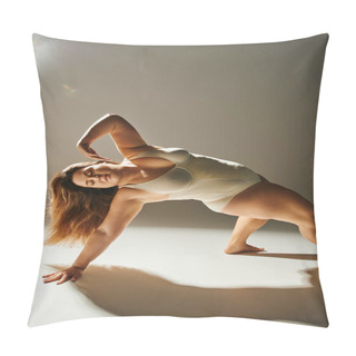 Personality  Plus Size Woman With Long Hair Wearing Beige Bodysuit And Doing Bridge Exercise While Posing On Grey Background With Studio Light, Body Positive, Figure Type, Diversity Of Body Pillow Covers