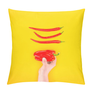 Personality  Cropped Shot Of Human Hand And Fresh Raw Red Peppers Isolated On Yellow Pillow Covers