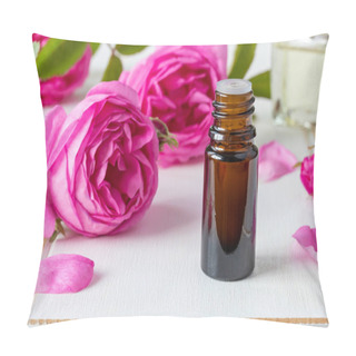 Personality  A Dark Bottle Of Essential Oil With Fresh Roses On A White Background Pillow Covers