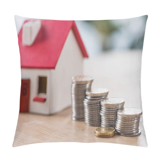 Personality  Selective Focus Of Stocked Silver And Golden Coins Near Toy House On Wooden Table Pillow Covers