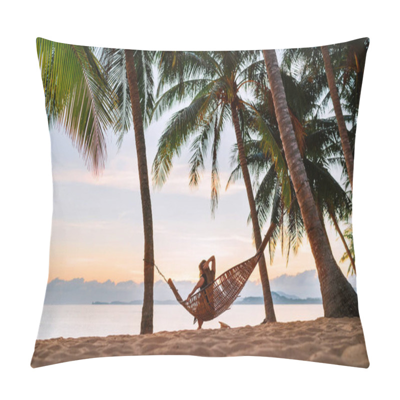 Personality  Young woman sitting in hammock swinging on the exotic island sand beach at sunrise time pillow covers