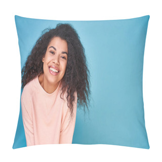 Personality  Headshot Of Lovely Curly Haired Woman With Cheerful Expression, Wide Friendly Smile, Looking At Camera, Wearing Bright Beige Sweater, Isolated On Blue Background, Looking Optimistic. Copy Space. Pillow Covers