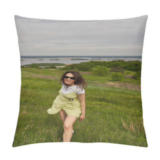 Personality  Cheerful And Stylish Brunette Woman In Sunglasses And Sundress Standing On Green Meadow With Grass And Spending Time With Blurred Landscape And Sky At Background, Summertime Joy Pillow Covers