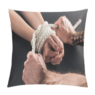 Personality  Cropped View Of Male Hands With Tattoo Tying Rope On Female Hands Pillow Covers