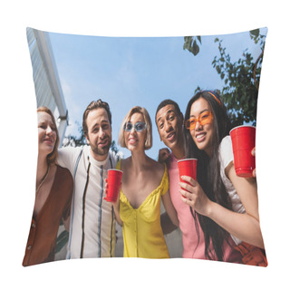 Personality  Low Angle View Of Multicultural Friends With Drink Looking At Camera During Party  Pillow Covers