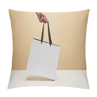 Personality  Cropped Image Of Woman Holding White Shopping Bag Above White Table Isolated On Beige Pillow Covers