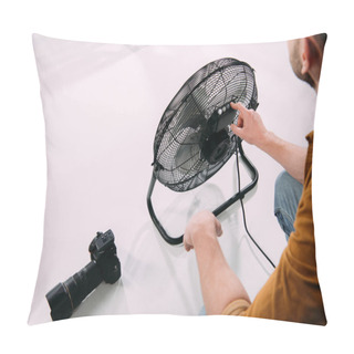 Personality  Cropped View Of Photographer Adjusting Electric Fan Near Digital Camera In Photo Studio  Pillow Covers