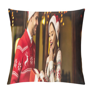 Personality  Panoramic Shot Of Cheerful Man Presenting Christmas Gift To Amazed Girlfriend Pillow Covers