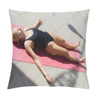 Personality  Smiling Woman In Bodysuit Meditating And Tanning On Mat On Urban Street  Pillow Covers