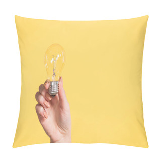 Personality  Cropped View Of Woman Holding Led Lamp In Hands Isolated On Yellow, Energy Efficiency Concept  Pillow Covers