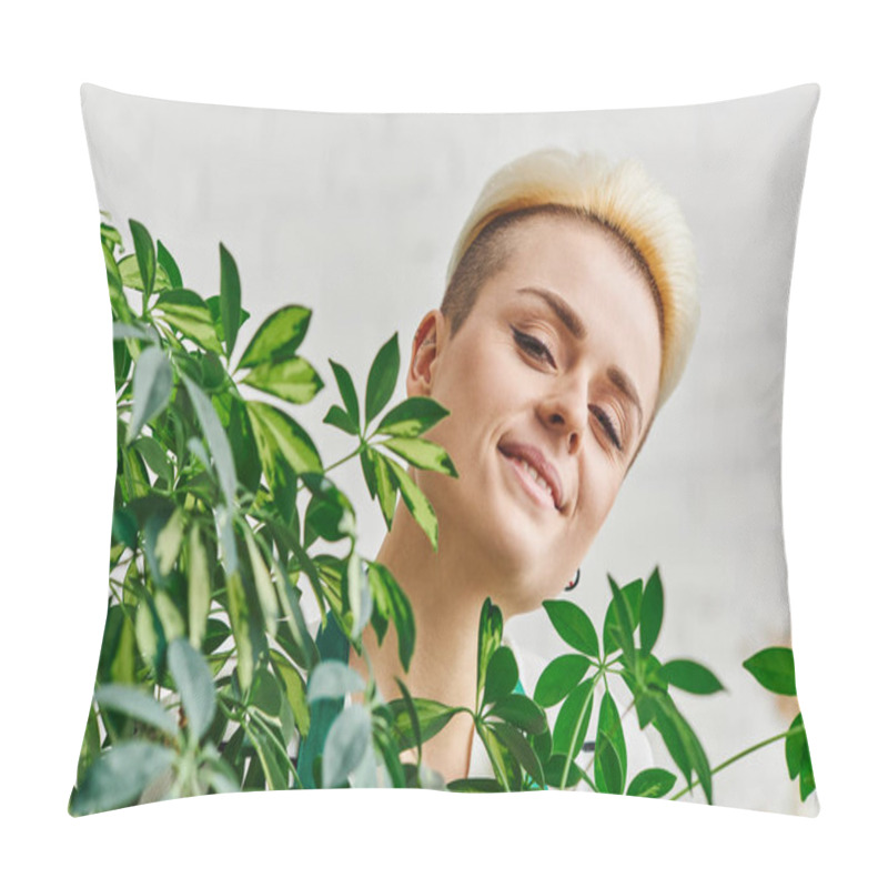 Personality  plant lover, portrait of happy young woman with radiant smile and trendy hairstyle looking at camera near green plant in living room, sustainable home decor and green living concept pillow covers