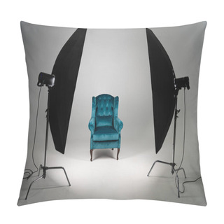 Personality  Blue Armchair With Studio Light On Grey Background Pillow Covers