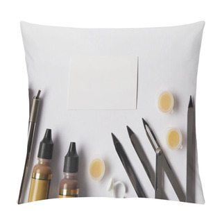 Personality  Top View Of Tools For Permanent Makeup And White Paper Isolated On White Pillow Covers