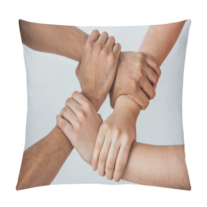 Personality  Cropped view of multiethnic men doing unity gesture isolated on grey pillow covers
