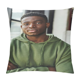 Personality  Confident And Fashionable African American Man Looking At Camera In Contemporary Office Space, Green Trendy Hoodie, Folded Arms, Young And Successful Entrepreneur Pillow Covers
