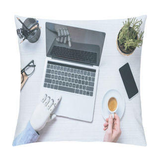 Personality  Cropped Image Of Businessman With Prosthetic Arm Using Laptop And Holding Coffee Cup At Table  Pillow Covers