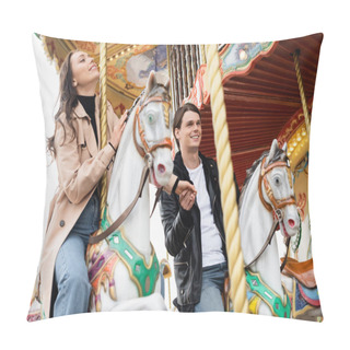 Personality  Happy Young Couple Holding Hands And Riding Carousel Horses In Amusement Park Pillow Covers