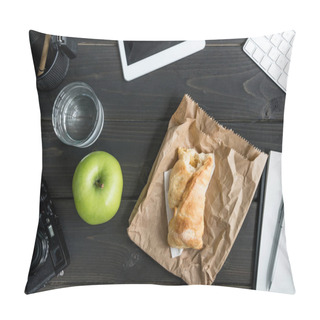 Personality  Top View Of Workplace With Apple, Bitten Bun, Glass Of Water And Digital Devices On Workplace Pillow Covers