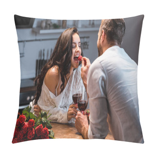 Personality  Couple With Glasses Of Red Wine At Wooden Table With Bouquet Of Roses, Man Feeding Woman With Strawberry Pillow Covers