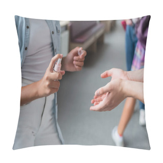 Personality  Cropped View Of Teenage Schoolgirl Spraying Hand Sanitizer On Hands Of Classmate Pillow Covers