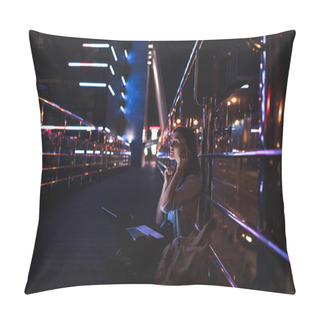 Personality  Side View Of Woman Listening Music In Headphones With Laptop On Knees On City Street At Night Pillow Covers