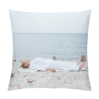 Personality  Attractive Blonde Woman With Closed Eyes Meditating While Lying On Yoga Mat Near Sea  Pillow Covers
