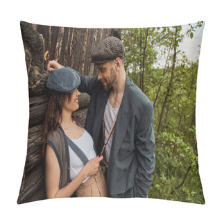Personality  Cheerful And Fashionable Woman In Newsboy Cap Touching Suspender On Bearded Boyfriend In Jacket While Standing Near Rustic House With Nature At Background, Stylish Couple In Rural Setting Pillow Covers