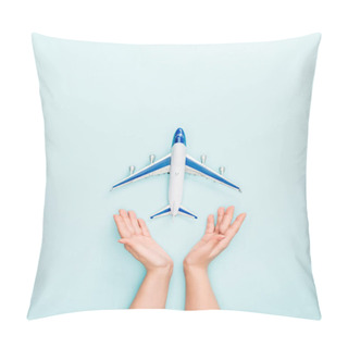 Personality  Cropped View Of Woman Holding Hands Near Toy Plane On Blue Background Pillow Covers