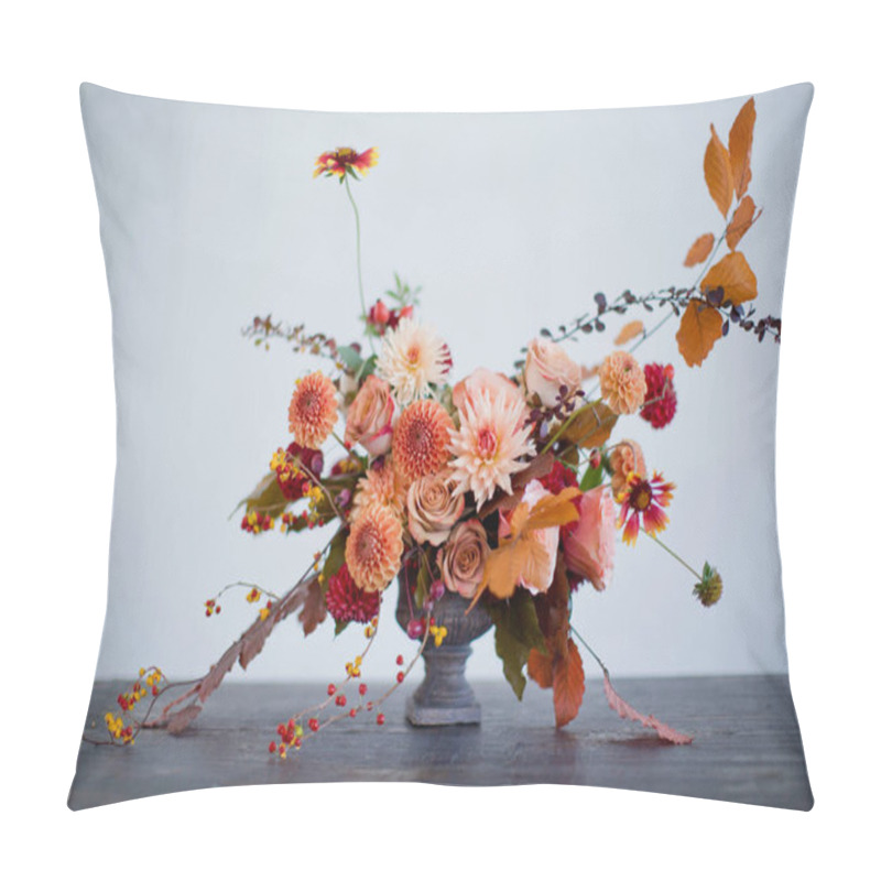 Personality  Beautiful flower composition with autumn orange and red flowers and berries. Autumn bouquet in vintage vase on a white wall background pillow covers