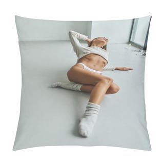 Personality  Passionate Woman With Pierced Belly Posing In Panties And Long Sleeve Shirt, Sitting On Floor Pillow Covers