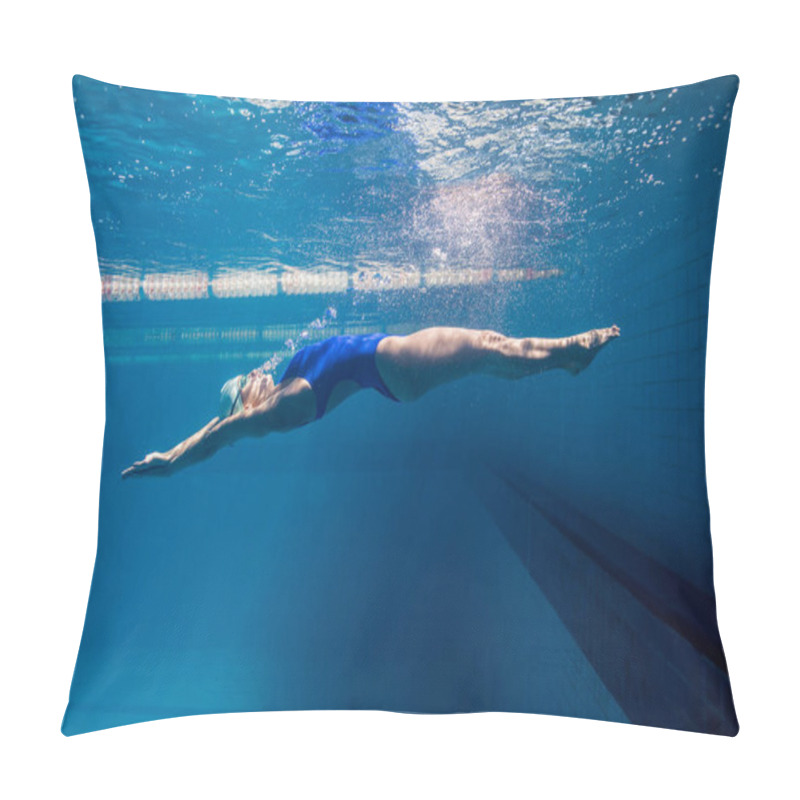 Personality  underwater picture of young female swimmer exercising in swimming pool pillow covers