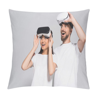 Personality  Excited Interracial Couple In White T-shirts Touching Vr Headsets While Looking Away With Open Mouths On Grey Pillow Covers