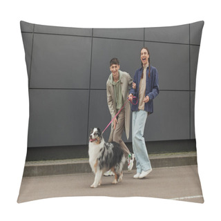 Personality  Excited Gay Man With Pigtails Holding Leash And Walking Out With Australian Shepherd Dog And Happy Boyfriend In Casual Outfit Near Modern Grey Building  Pillow Covers