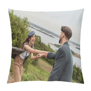 Personality  Fashionable And Cheerful Brunette Woman In Vest And Newsboy Cap Holding Hand Of Bearded Boyfriend In Jacket While Standing With Nature At Background, Fashion-forwards In Countryside Pillow Covers