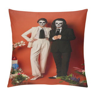 Personality  Couple In Scary Skull Makeup And Suits Near Festive Dia De Los Muertos Ofrenda With Flowers On Red Pillow Covers