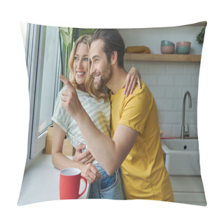 Personality  Beautiful Young Couple Looking Through A Window And Smiling While Standing At The Kitchen Pillow Covers