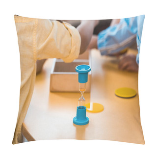 Personality  Selective Focus Of Kids With Educational Game And Hourglass At Desk In Montessori School Pillow Covers
