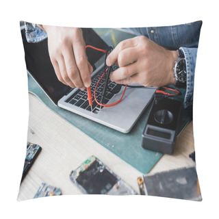 Personality  Cropped View Of Repairman Holding Sensors Of Multimeter On Broken Keyboard Of Laptop With Blurred Disassembled Phones On Foreground Pillow Covers
