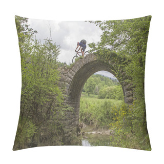 Personality  Crossing An Old Narrow Arch Bridge By Mountain Bike Pillow Covers