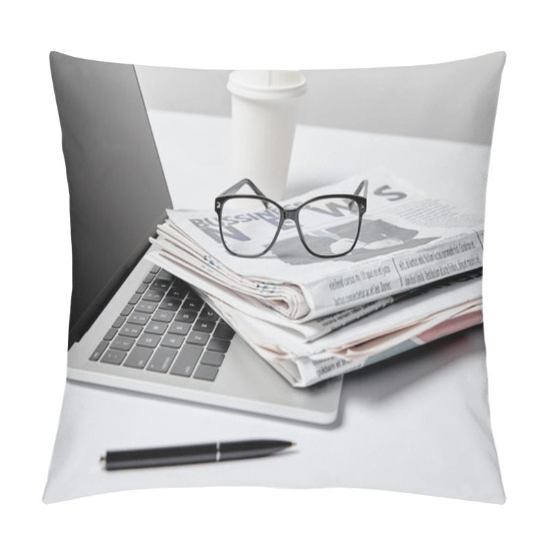 Personality  Selective Focus Of Laptop With Blank Screen Near Business Newspapers,glasses, Pen And Paper Cup On White  Pillow Covers