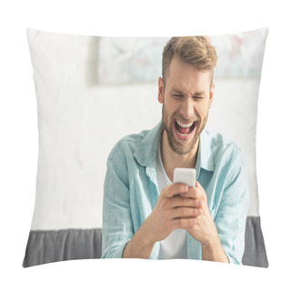 Personality  Selective Focus Of Cheerful Man Laughing While Using Smartphone On Couch  Pillow Covers