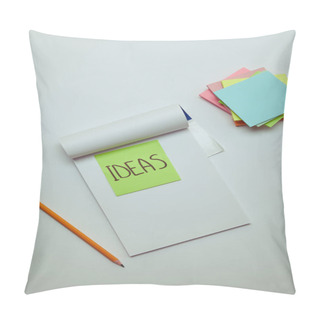 Personality  Top View Of Paper Sticker With Word Ideas In Notebook, Pencil And Pile Of Note Papers On White Tabletop Pillow Covers