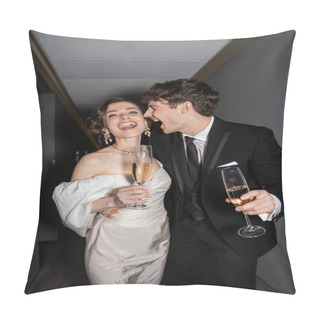 Personality  Excited Groom Hugging Young And Brunette Bride In White Wedding Dress And Holding Glasses Of Champagne While Standing And Smiling Together In Hallway Of Hotel, Newlyweds On Honeymoon  Pillow Covers