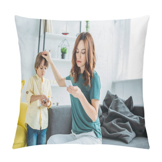 Personality  Pretty Woman With Smartphone Touching Head Of Cute Son Standing Near And Using Smartphone Pillow Covers