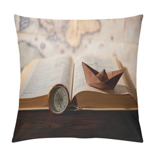 Personality  Selective Focus Of Paper Boat, Book, Map And Compass On Table Pillow Covers